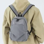 Plecak męski IPRee Oxford Mini nowy jednolity kolor wodoodporny mały plecak na ramię do szkoły lekki odporny na zużycie plecaki podróżne męskie Wyprzedaż Banggood Polska Mobile arrival notice